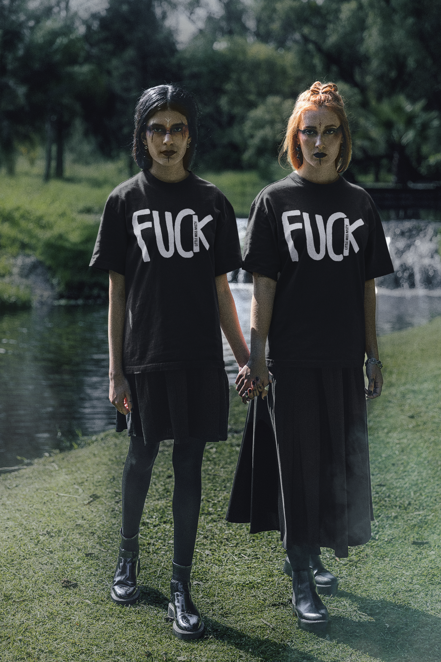 round-neck-tee-mockup-of-two-women-holding-hands-in-a-wicca-themed-setting-m29747.png