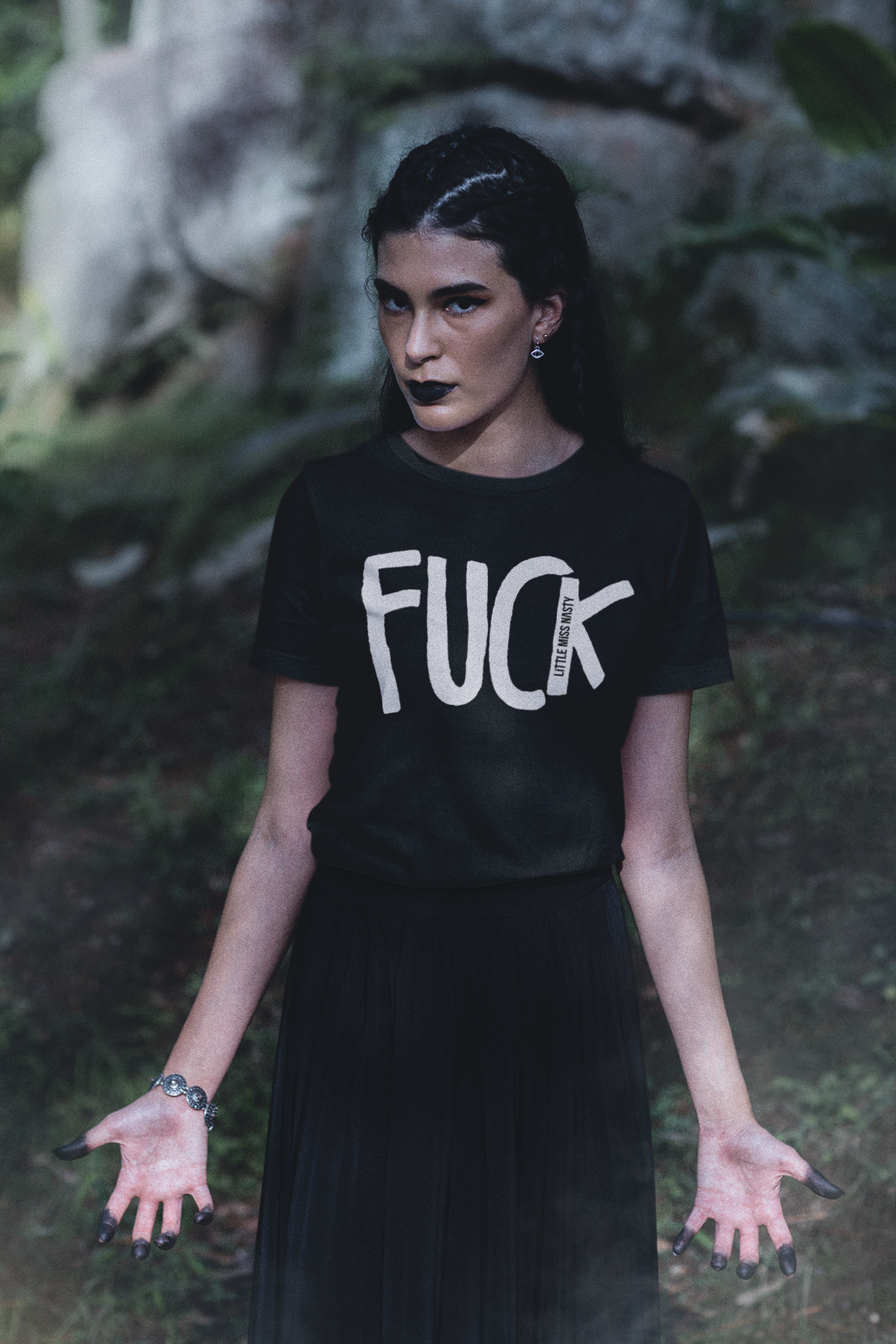 bella-canvas-tee-mockup-featuring-a-woman-with-a-wicca-themed-outfit-in-a-forest-m29713.png