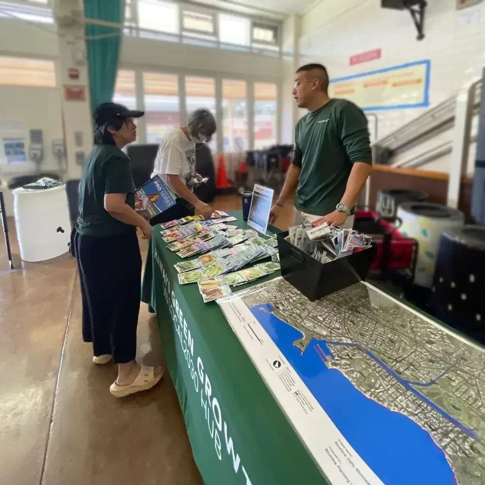 Hawaii Green Growth educating the community about their free rainwater assessments at the Smart Yards 2024 Workshop hosted by Mālama Maunalua and 3Rwater
