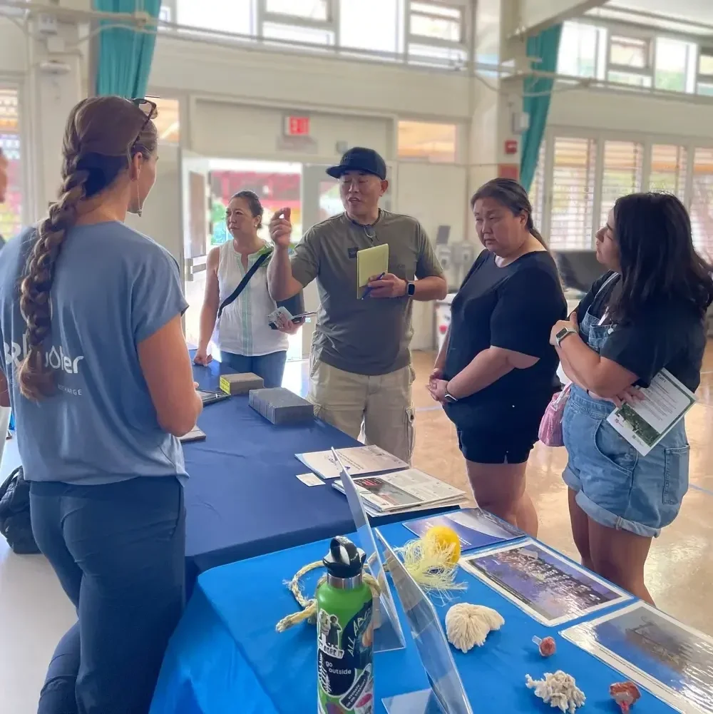 Community members learn about restoring the water cycle and building resilience using technology with the Follow the Drop app from 3Rwater at the Smart Yards 2024 Workshop hosted by Mālama Maunalua and 3Rwater