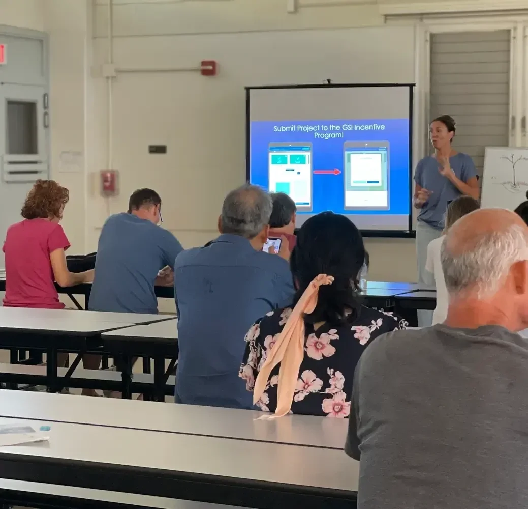 3Rwater teaching the community how to submit projects to the Green Stormwater Incentive Program using the Follow the Drop app at the Smart Yards 2024 Workshop hosted by Mālama Maunalua and 3Rwater