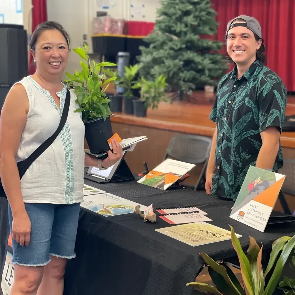 Lē'ahi Landscaping, Hawaiʻi’s all-electric landscaping company, with a community member at the Smart Yards 2024 Workshop hosted by Mālama Maunalua and 3Rwater