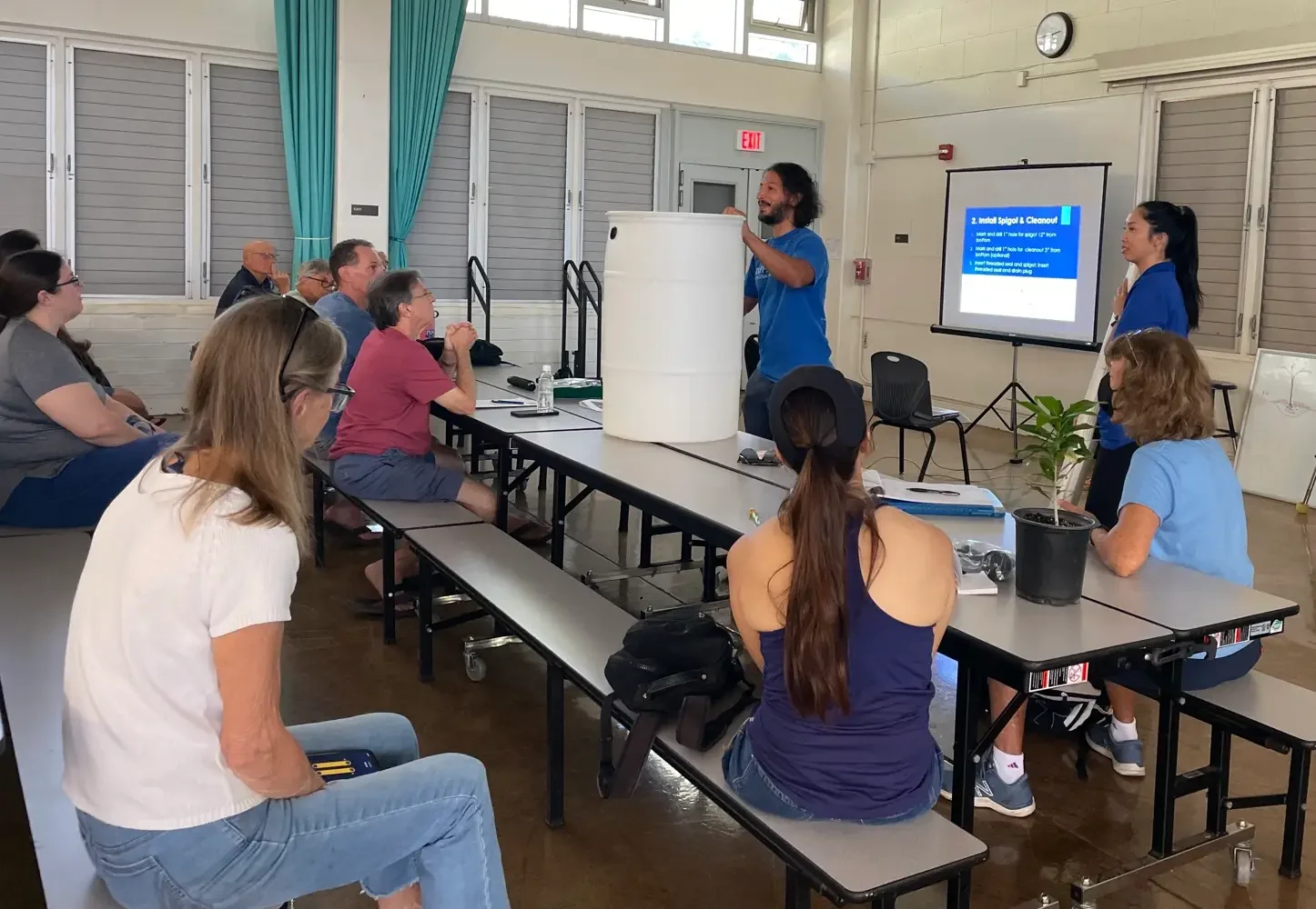 City and County of Honolulu Department of Facility Maintenance Storm Water Quality Division teaching about rain barrel benefits at the Smart Yards 2024 Workshop hosted by Mālama Maunalua and 3Rwater