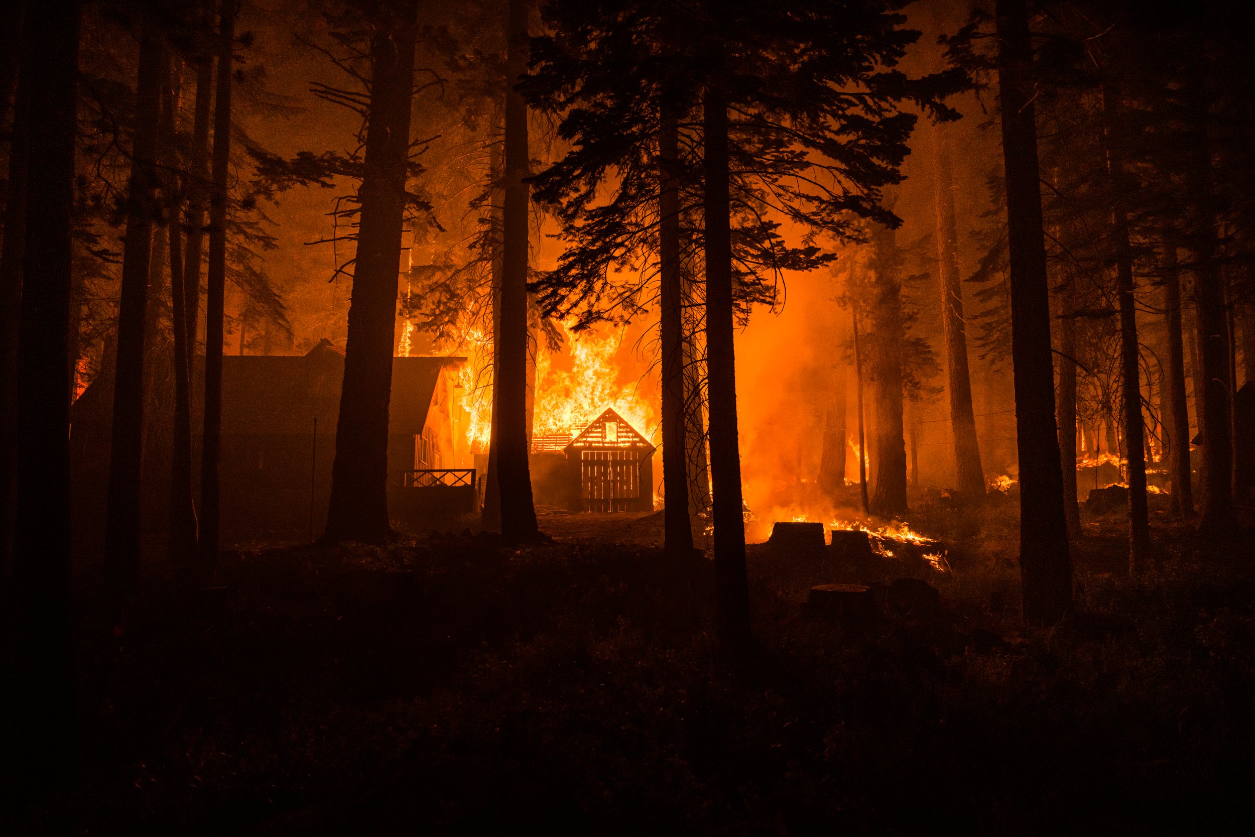  The Calfor fire rips through the canyon from Strawberry Lodge toward Lake Tahoe basin, in California, as firefighters with CAL FIRE and other fire departments try to protect homes and shelters across the area, August 29, 2021.Jamie bardwell 26 from 