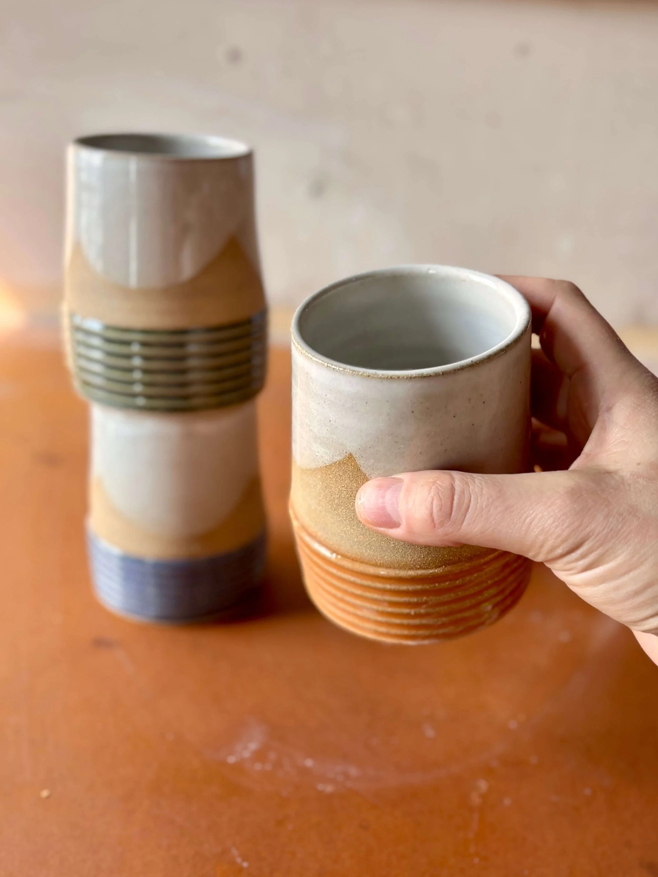 earth_lines_cups_trio_hand.jpg