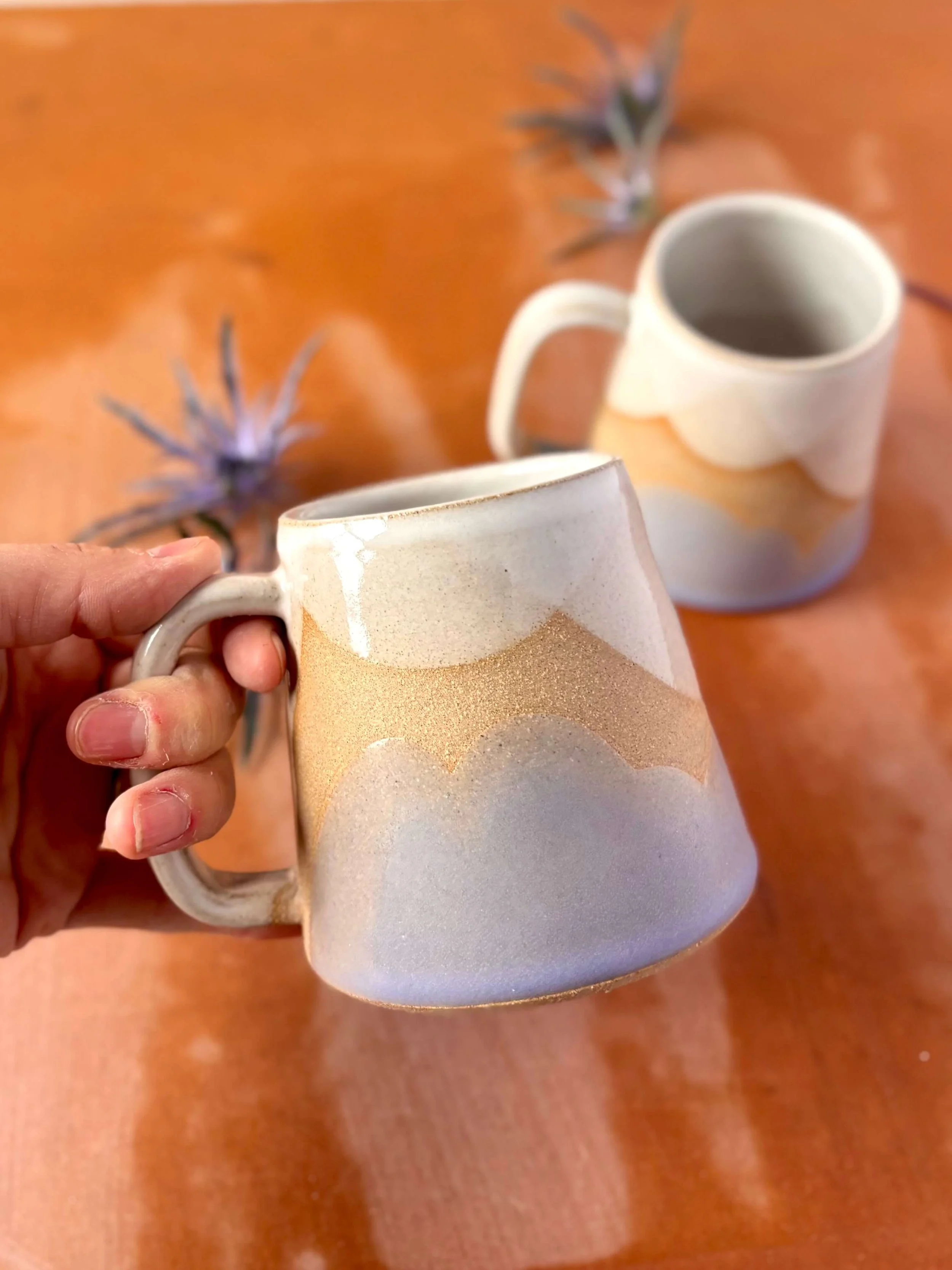Horizon_dusk_mug_held.jpg