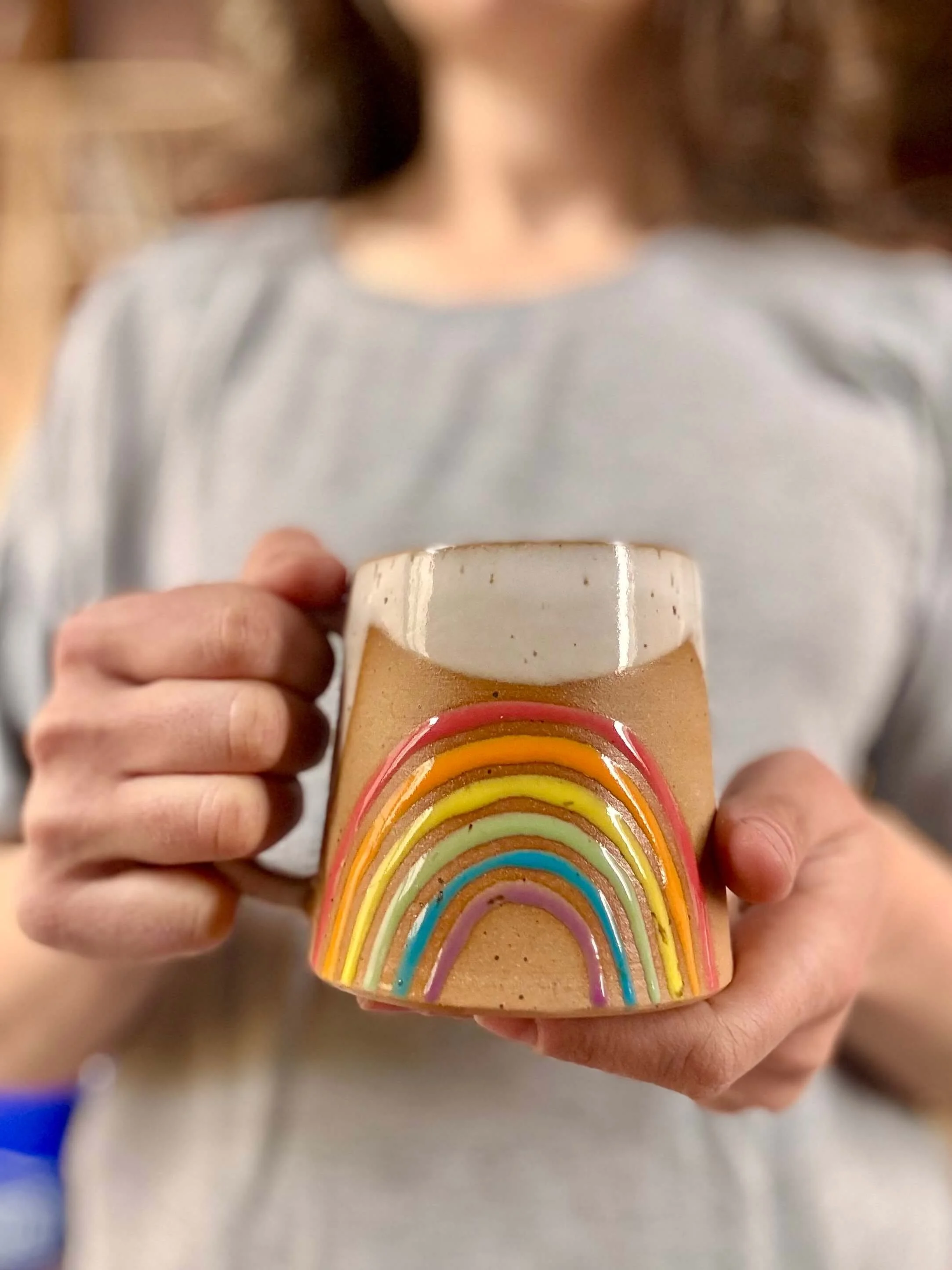 rainbow_mug_held.jpg