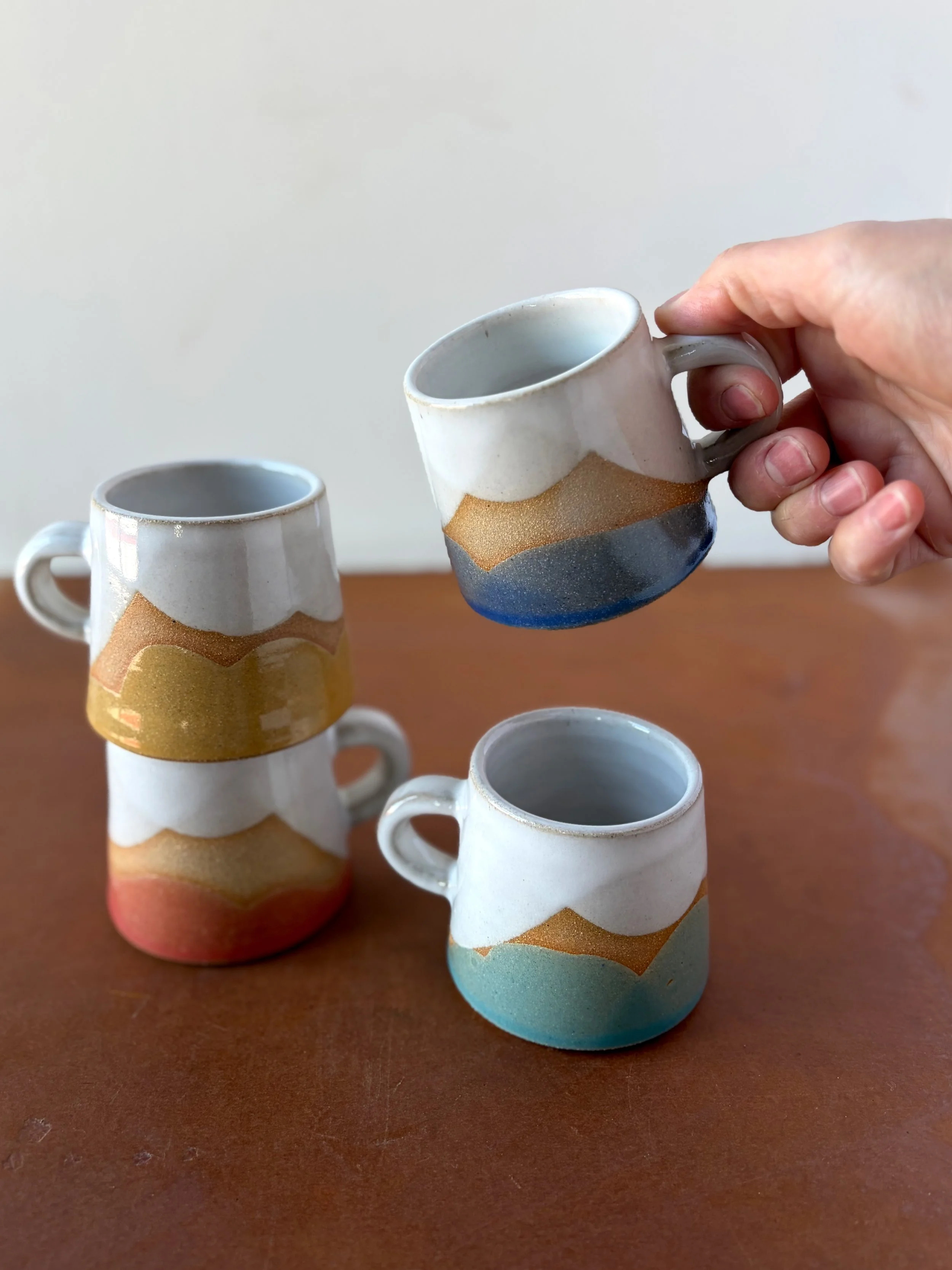 summer_espresso_group_hand.jpeg