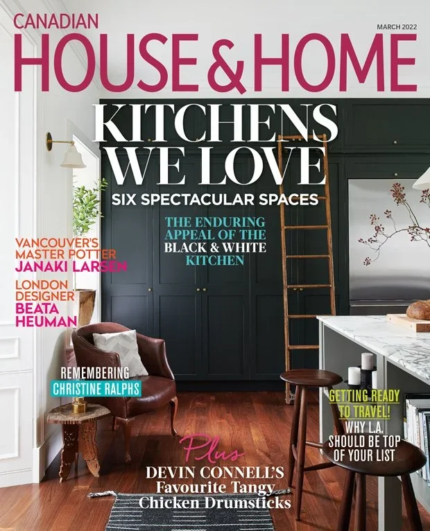 Cover of Canadian House & Home magazine, March 2022 issue, featuring a modern kitchen with dark cabinetry, a wall ladder, a leather chair, and decorative plants, highlighting stylish spaces and design tips.