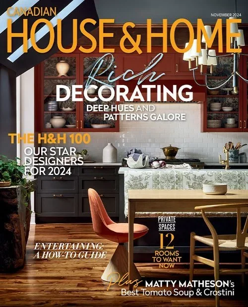 Cover of Canadian House & Home magazine, November 2024 issue, featuring a modern kitchen with maroon upper cabinets, black lower cabinets, a wooden table, and a variety of decorative items and dishes on the counter.