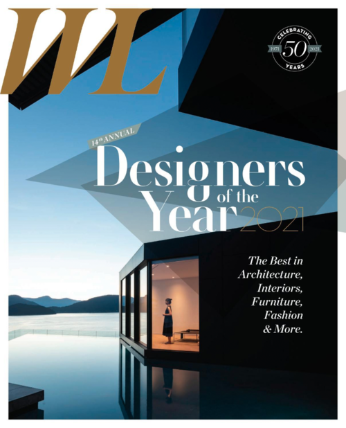 Cover of a magazine celebrating the 50th anniversary, featuring a modern architectural building by a body of water with a person inside, for the 14th Annual Designers of the Year 2021, highlighting architecture, interiors, furniture, fashion, and more.