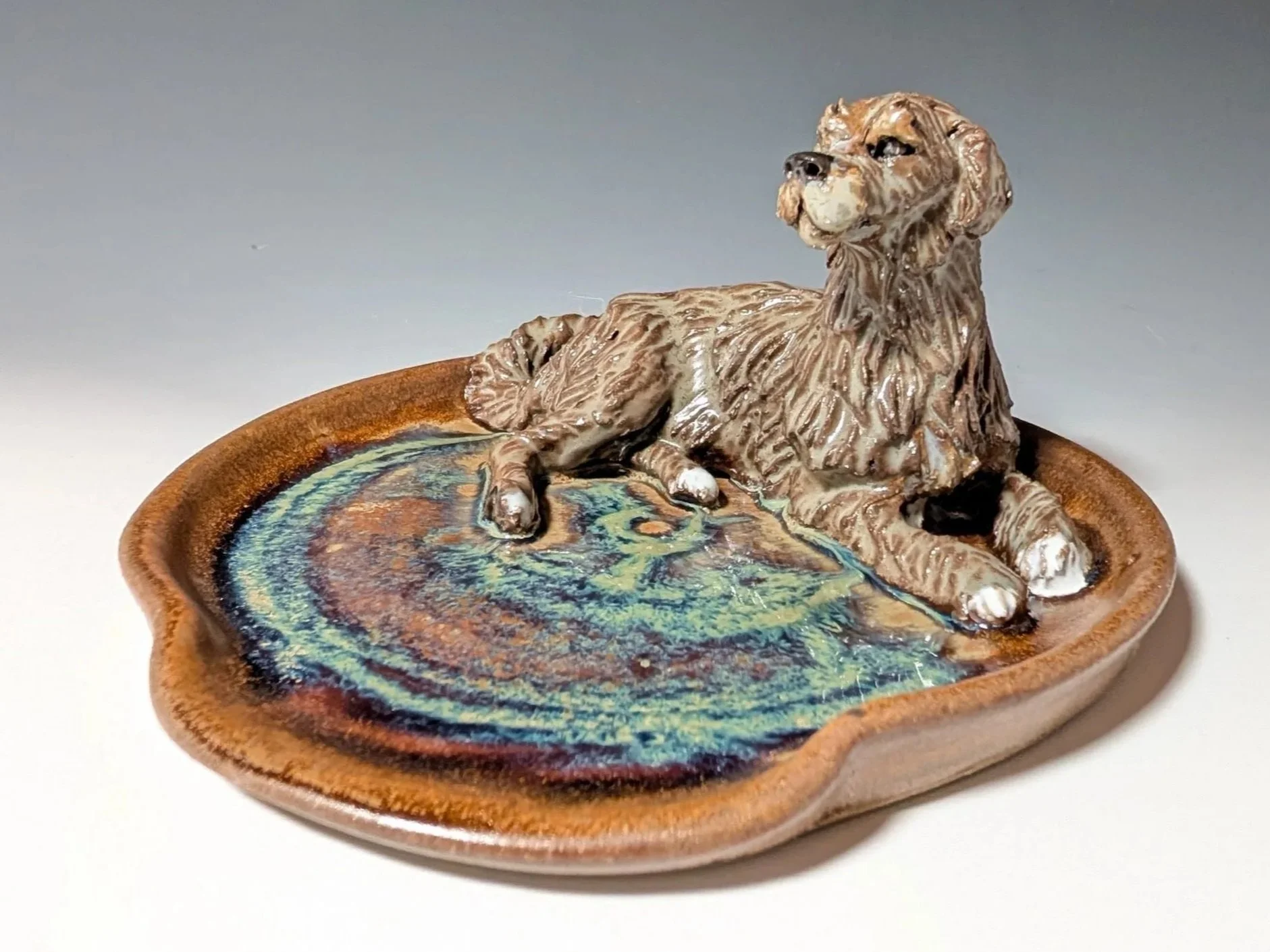 Custom Irish wolfhound figurine on a spoon rest plate.