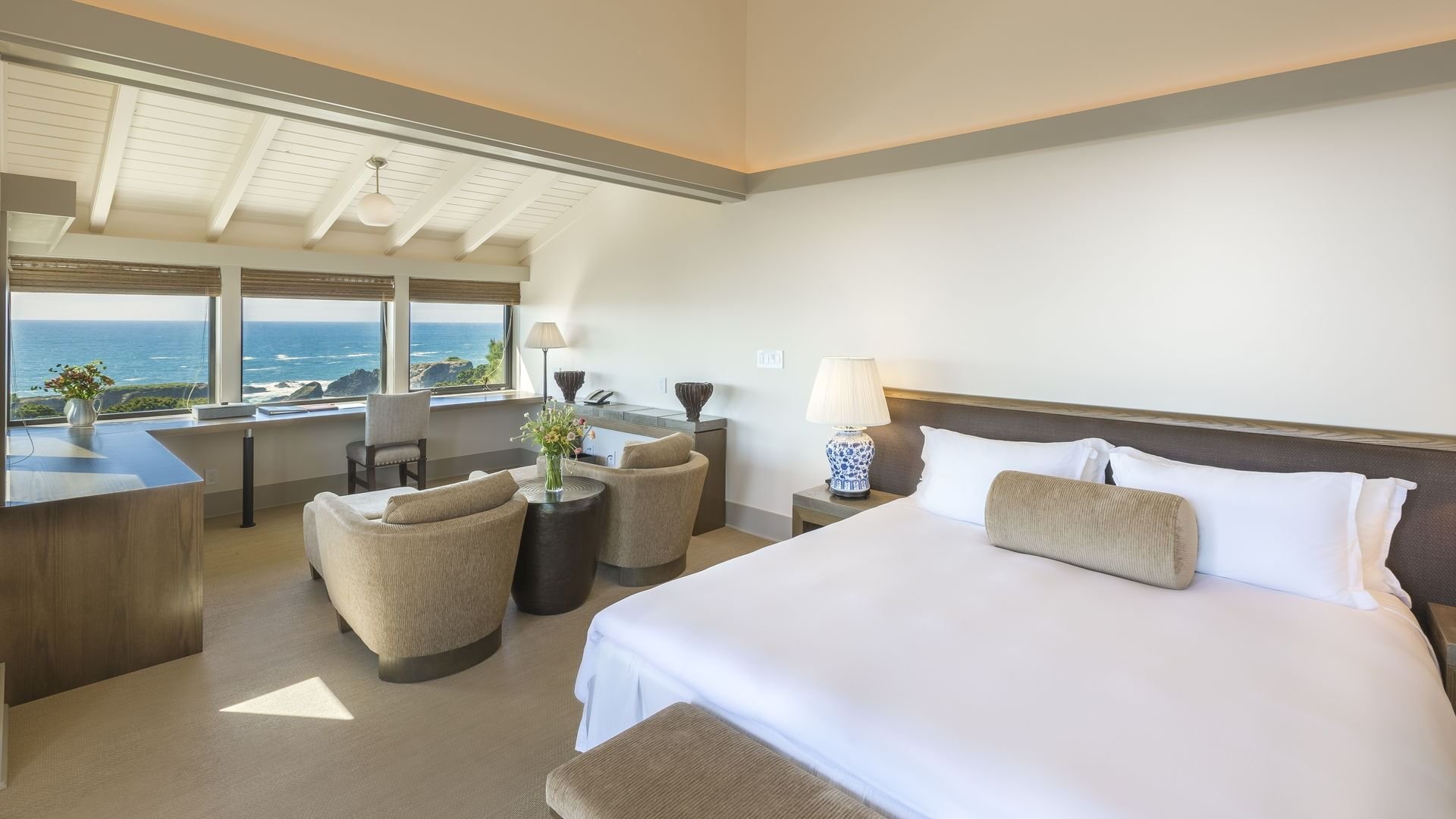 Bedroom of Heritage Suite with king bed at Heritage House Resort