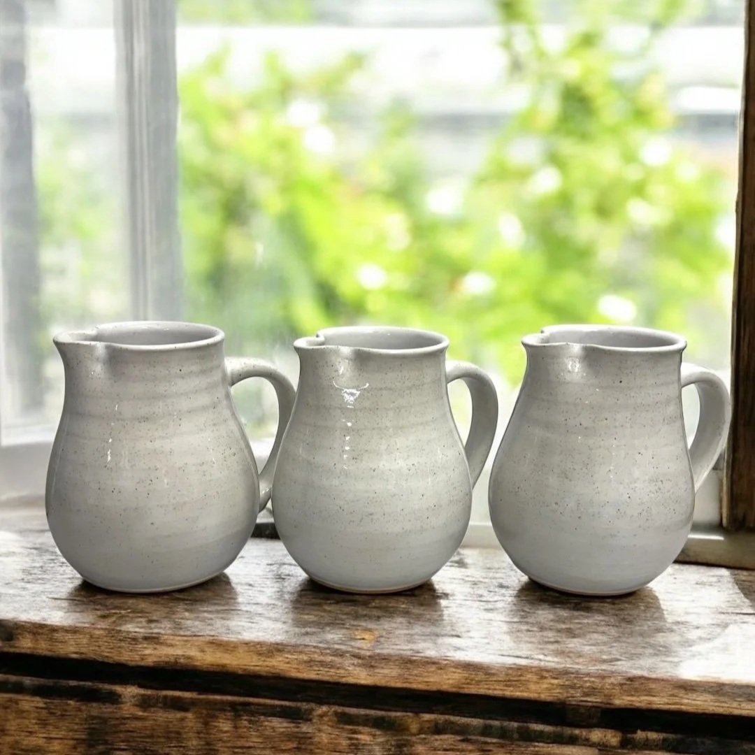 Handmade ceramic jug with handle and spout, wheel-thrown Australian pottery with natural throw rings