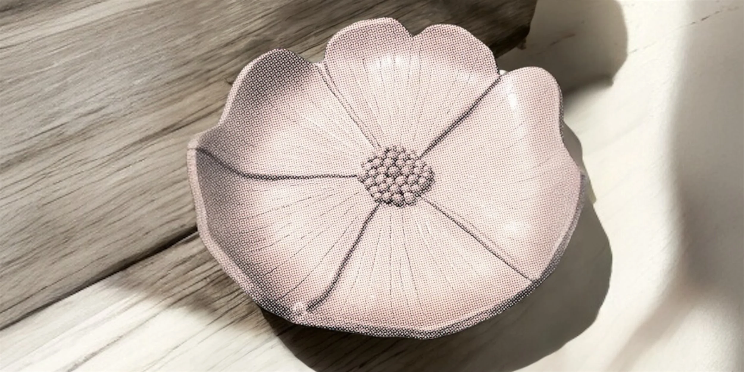 Hand-built ceramic bowl with soft curves from the Blossom Curves workshop