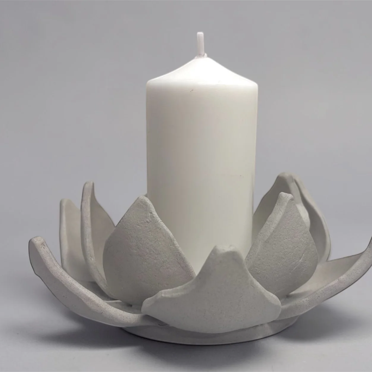 Lotus Candles Workshop, a 2 hour quiet, hands- on workshop where you create two lotus candle holders shaped slowly petal by petal, inviting you to pause and make something calm and considered.  $150 per person, ages 15 and over only