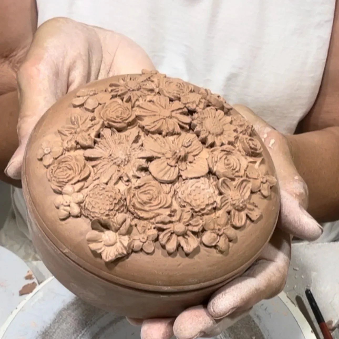 In this very special 2 hour workshop, you'll transform a wheel-thrown ceramic box, thoughtfully handcrafted by Danielle, into a beautiful blossom-inspired keepsake. Using our collection of clay flower moulds, you'll create and apply delicate floral d