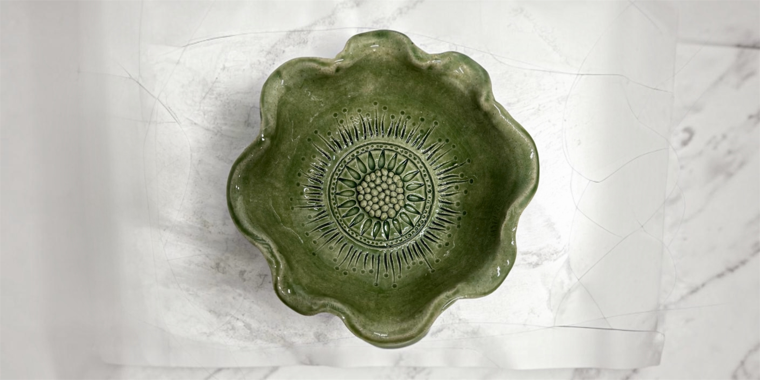 Hand-built ceramic mandala bowl with a circular patterned design at the centre, created for the Mandala bowl pottery workshop at Gumtree Wellness.