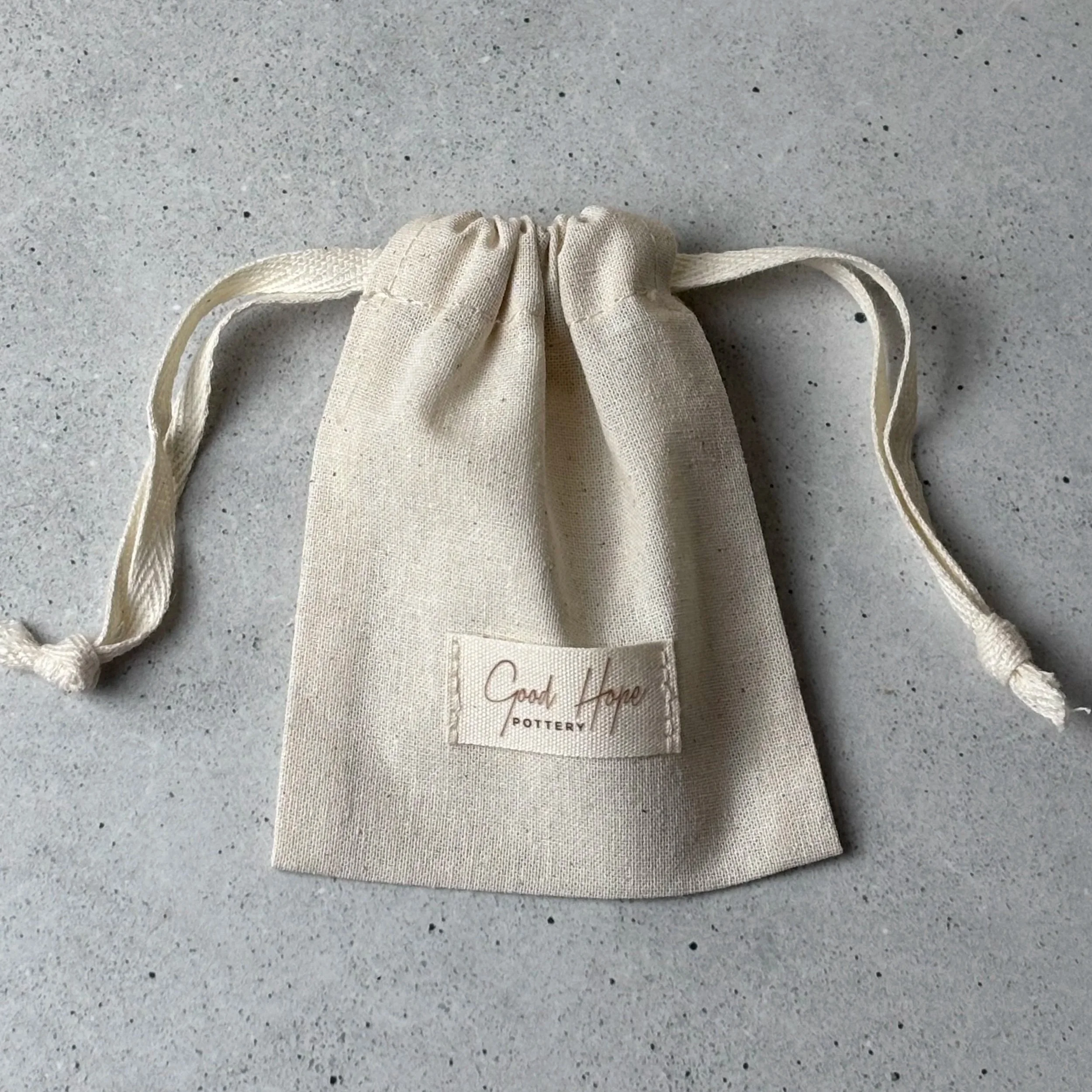 Good hope pottery linen gift bag
