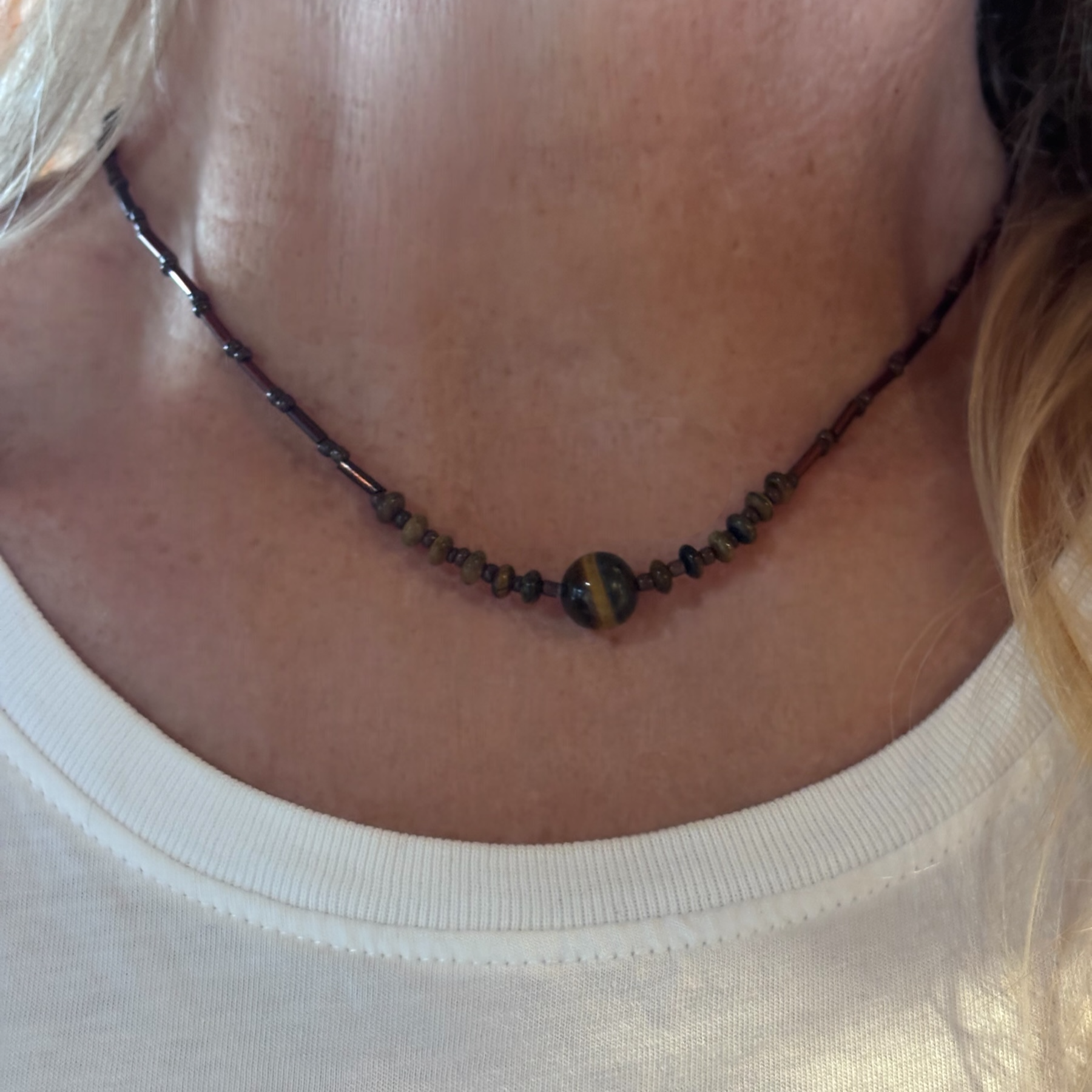 anchored necklace featuring tiger eye stone
