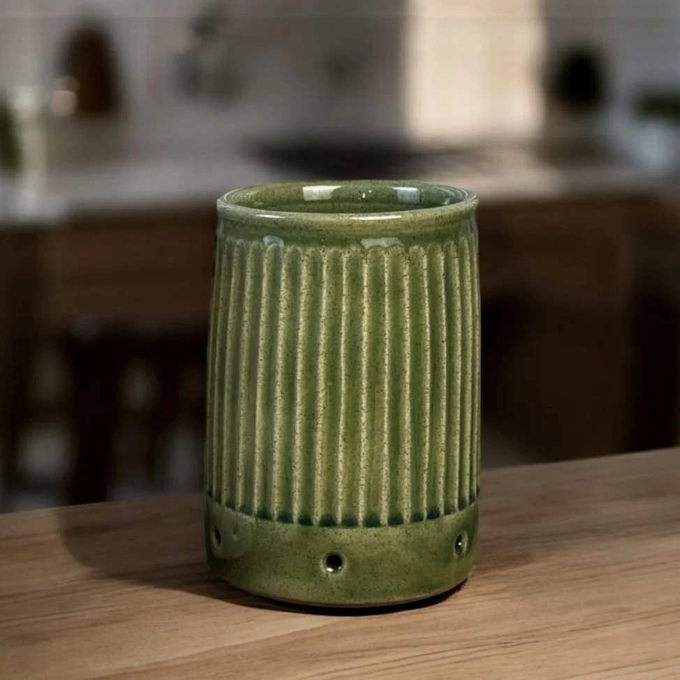 Handmade ceramic utensil jar with hand fluted texture in jade glaze, tall kitchen storage pottery in Australia