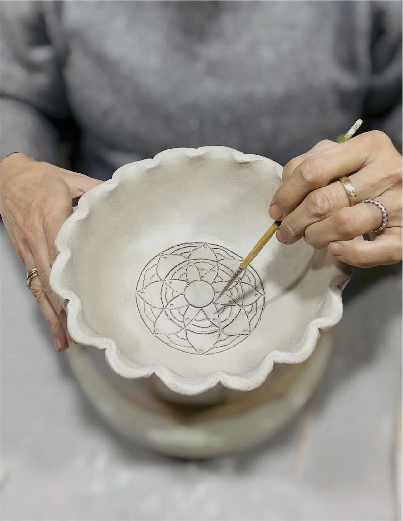 Hand-built ceramic mandala bowl with a circular patterned design at the centre, created for the Mandala bowl pottery workshop at Gumtree Wellness.