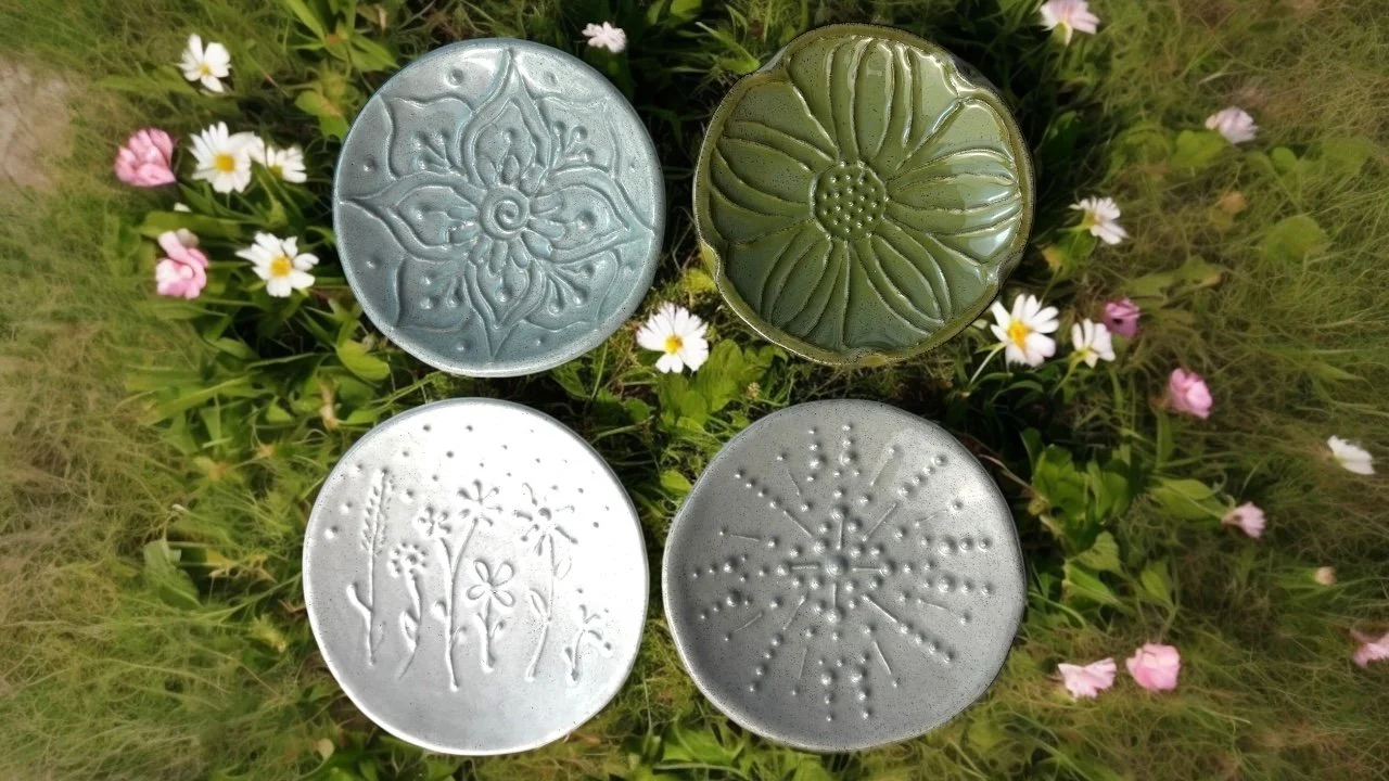 small pottery dishes with slip design for a workshop