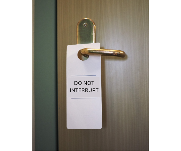 Do not interrupt sign hanging off the know.