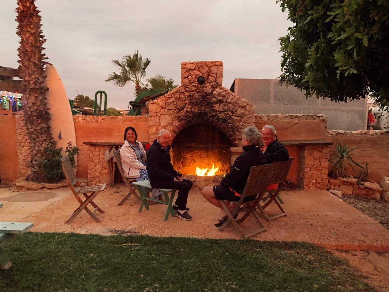 Shark Bay Cottages outdoor fireplace courtyard bar.jpeg