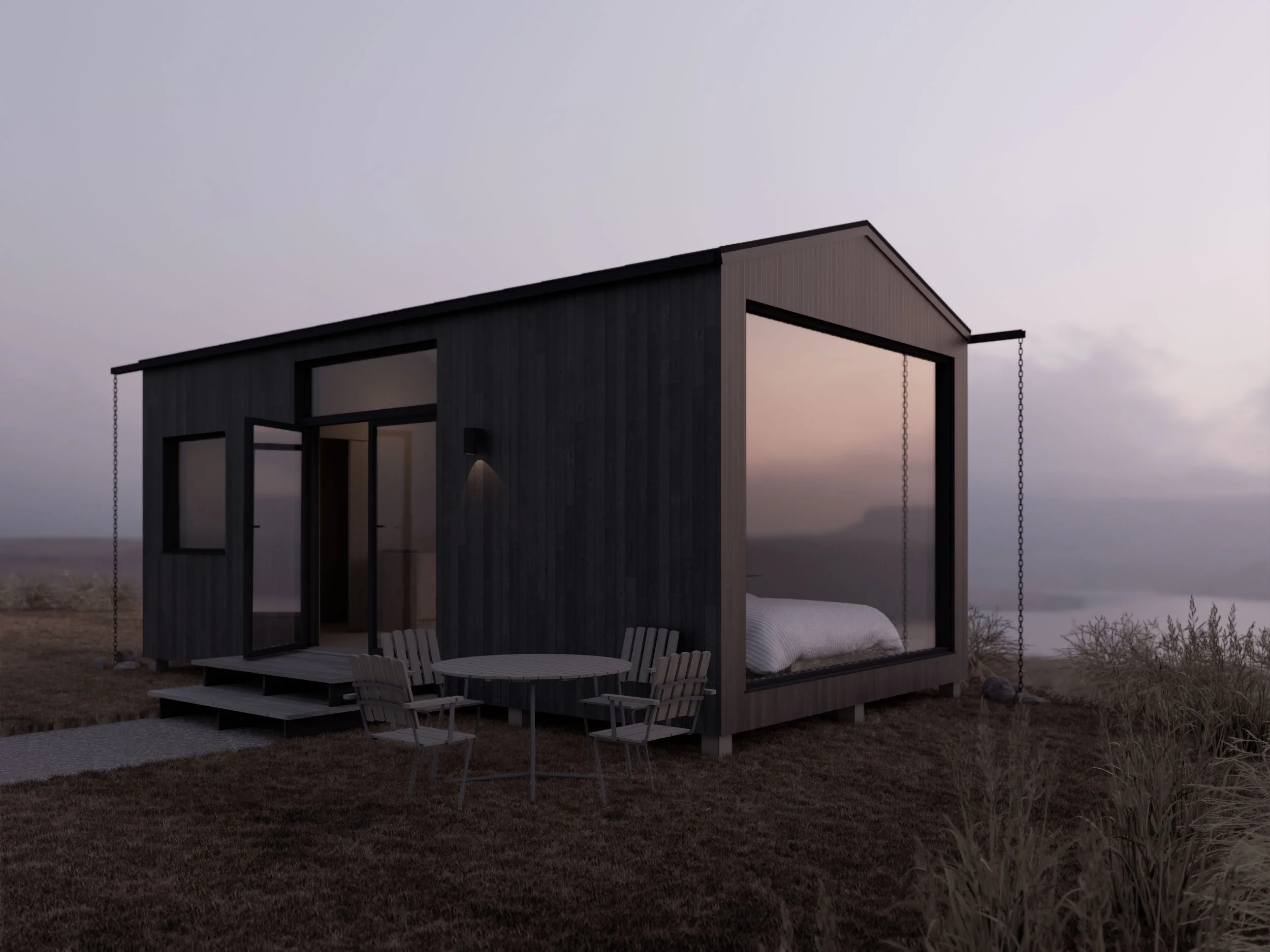 30 sqm permit-exempt house with dark timber façade, simple gabled roof and generous floor-to-ceiling glazing.