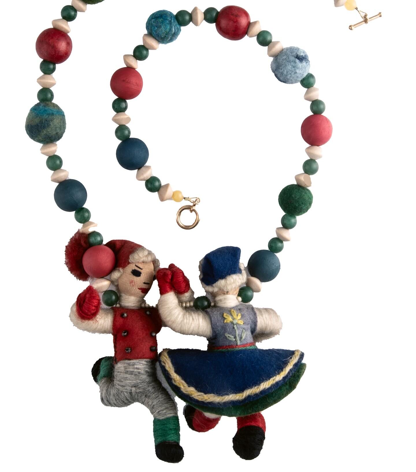 N E W 

Two joyful vintage wool folk art figures, dancing the night away, form the reversible pendant to a lightweight necklace of felted wool and hand painted wood beads. 
#folkartdolls #folkartdoll #wooldoll #dontfollowthecrowd #individualstyle #jo