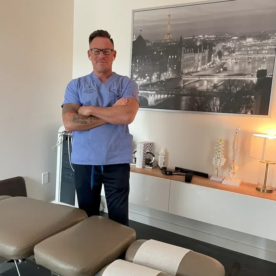 Dr. Robb Fishman in a chiropractic treatment room at his Monroeville office
