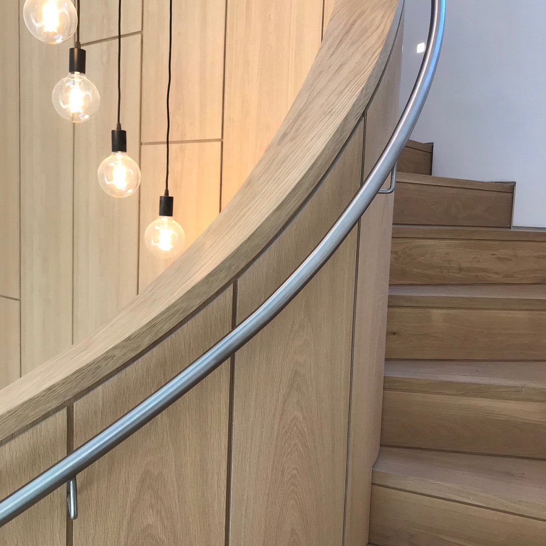 AD Designs bespoke rolled stainless handrail