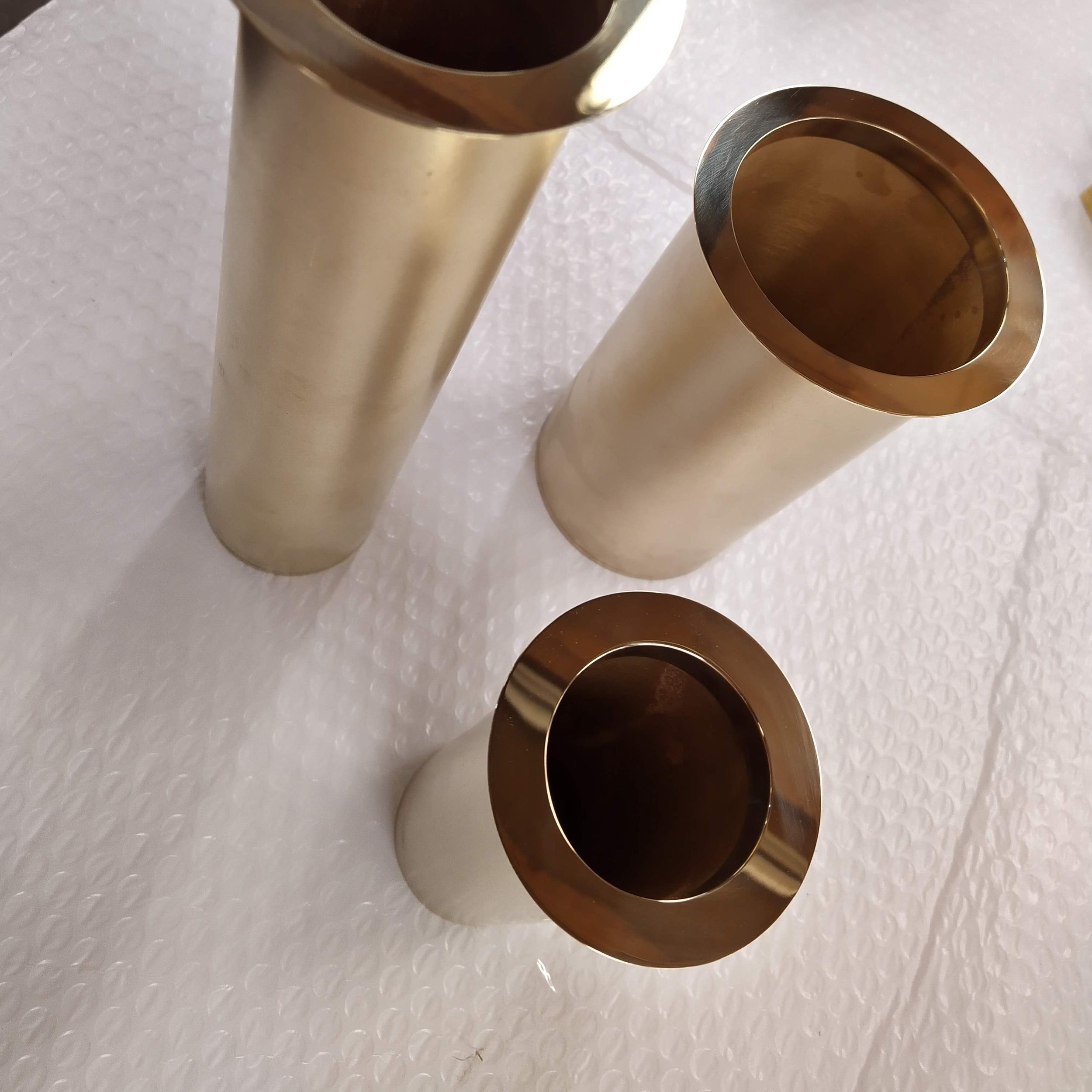 AD Designs hand spun bespoke polished brass bezels