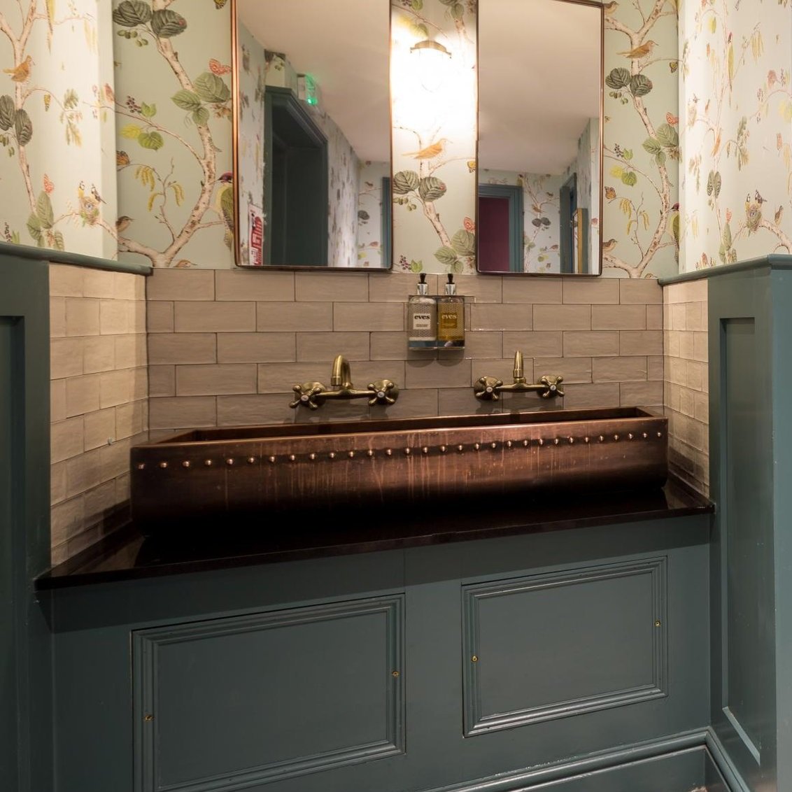 AD Designs bespoke aged copper sink trough with rivet detail