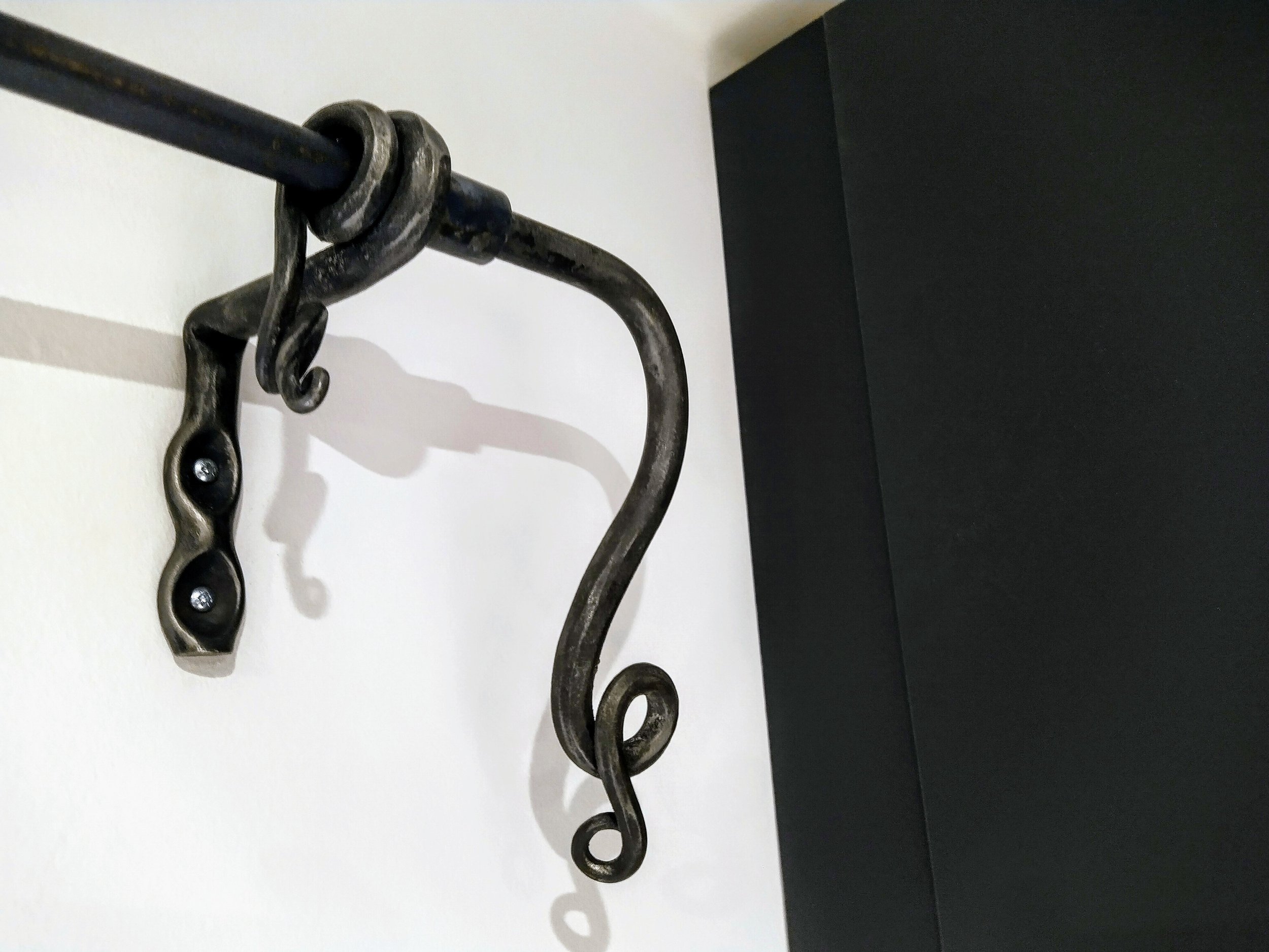 AD Designs hand forged bespoke curtain pole bracket and end