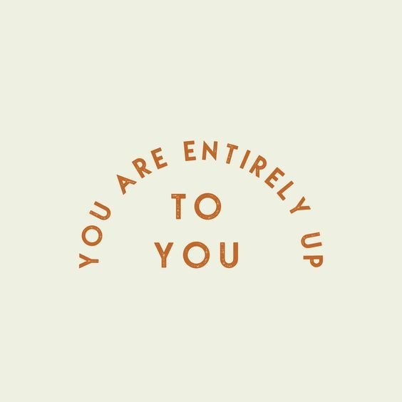Lettering saying 'You are entirely up to you' in brown text on a light background.