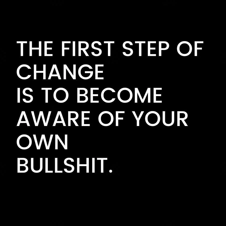 Inspirational quote on black background that reads, 'The first step of change is to become aware of your own bullshit.'