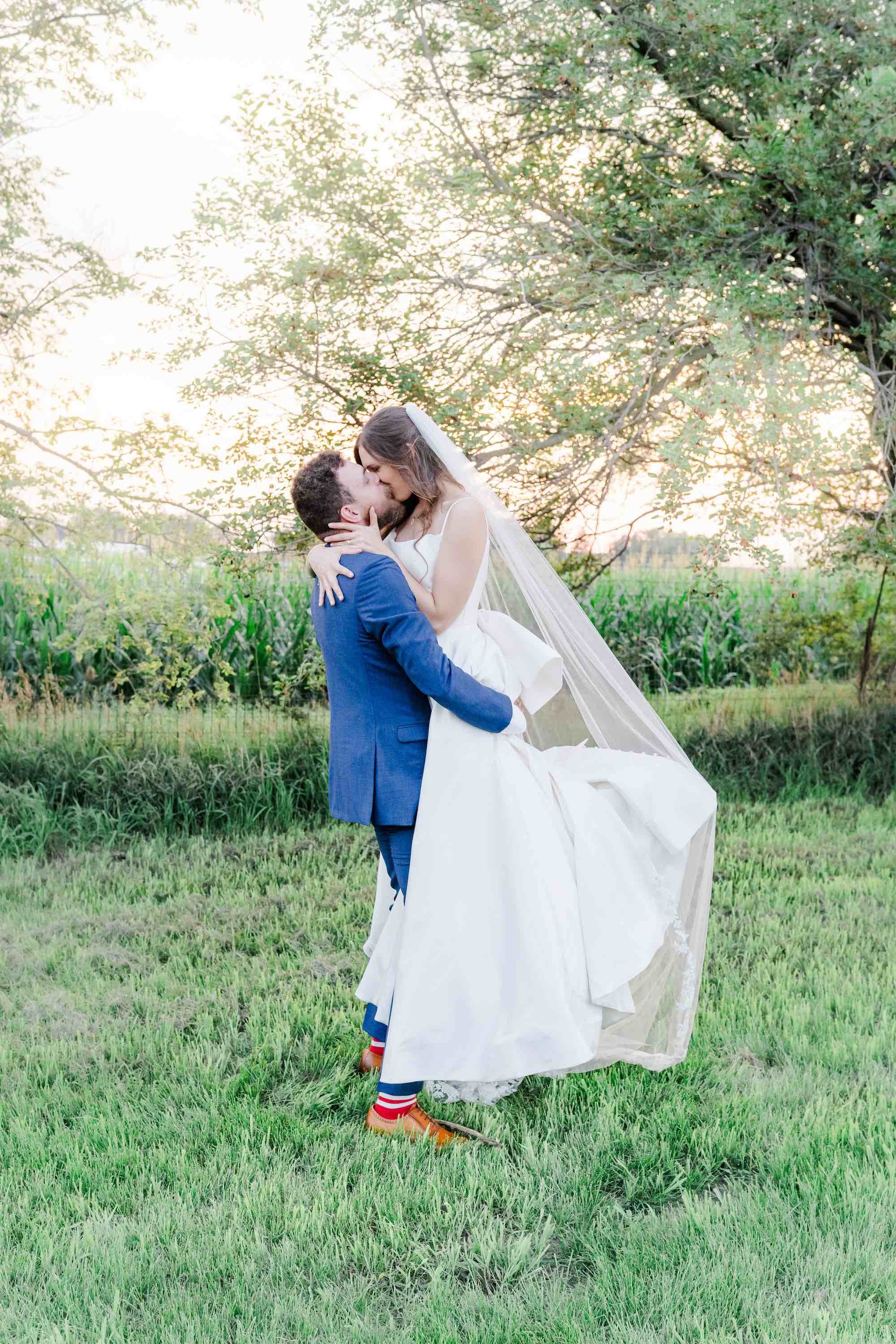 bride and groom kissing