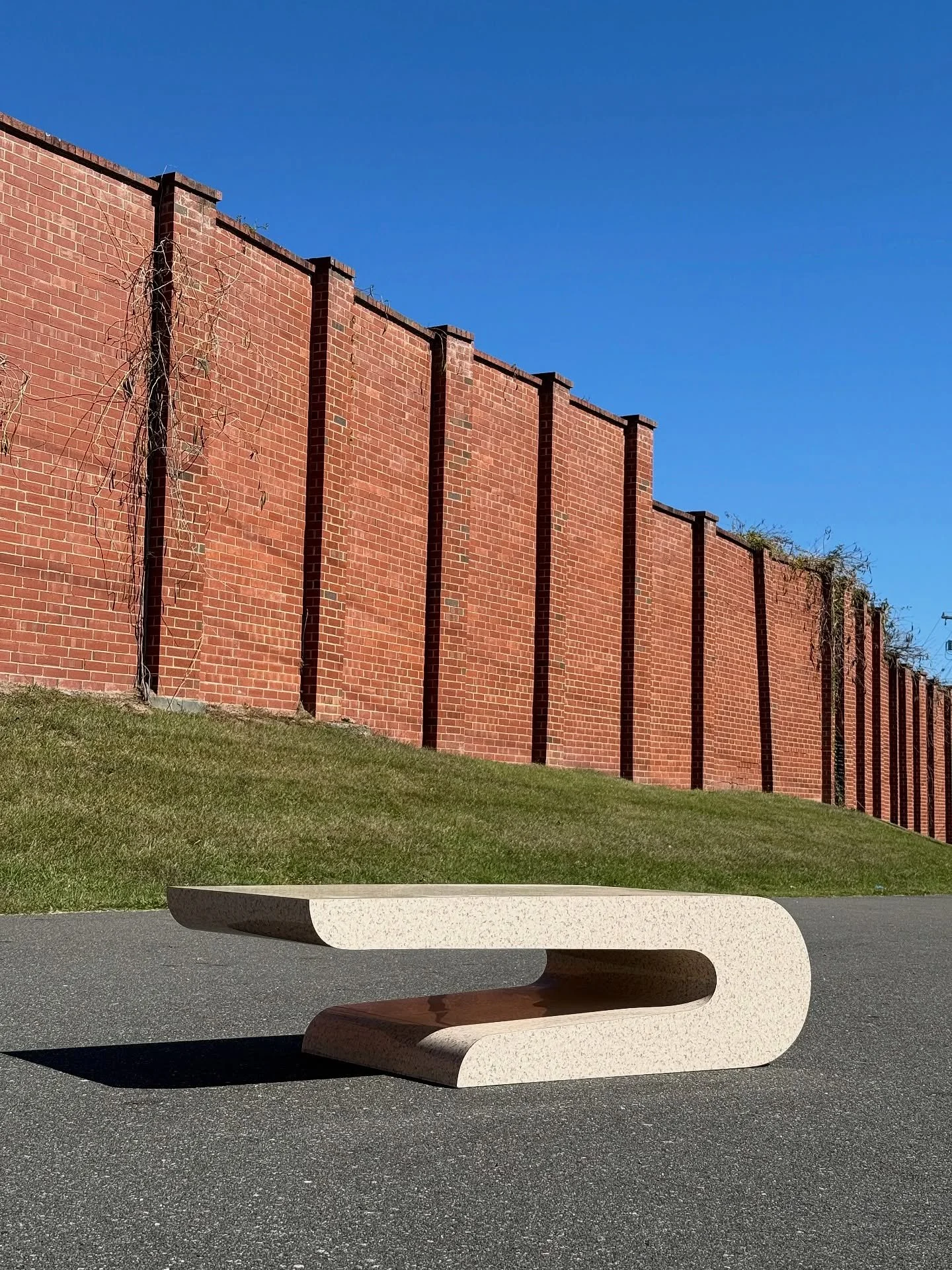 AVAILABLE ~ Postmodern faux stone coffee table in the manner of Pierre Cardin
This piece is quite large with a unique cantilevered shape. Faux granite laminate top and sides allow the piece to be extremely durable. The neutral color allow it to be b