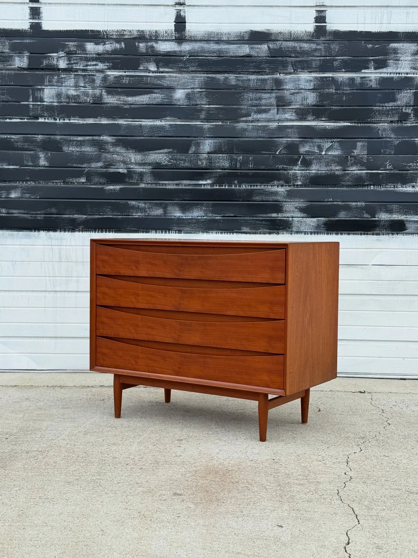 SOLD ~ Compact four drawer dresser by Arne Vodder. Sleek, teak, and petite. The Danish dressers have been flying lately. They&rsquo;re the perfect balance of mid-century and minimalism. Clean lines and always excellent craftsmanship. We&rsquo;ve deli