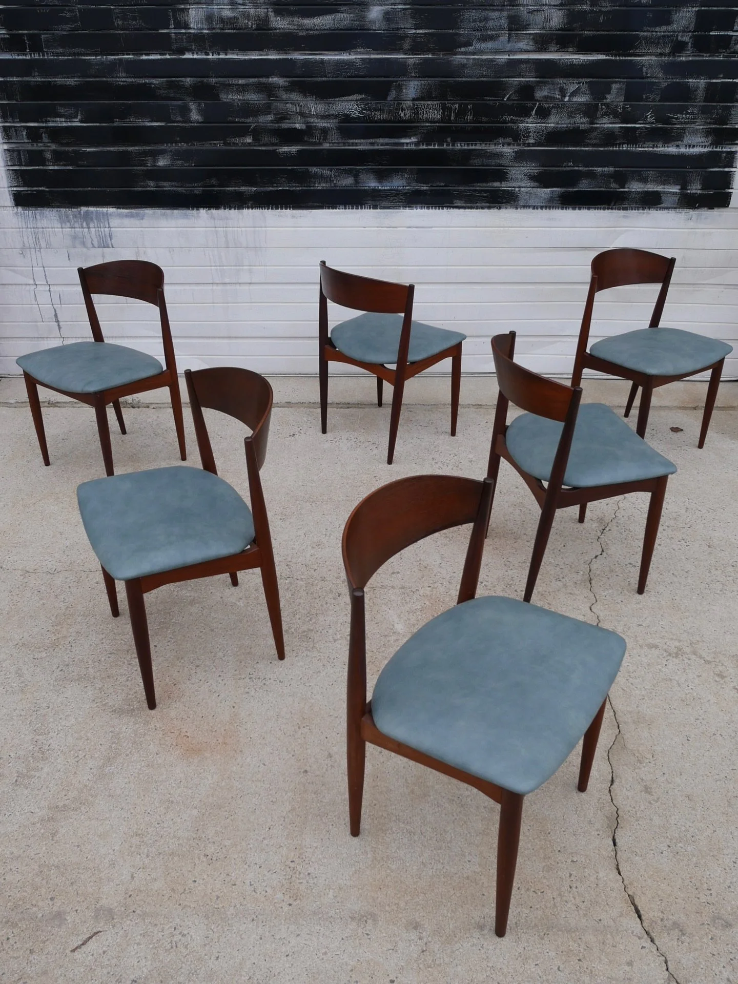 AVAILABLE ~ Mid-century set of six dining chairs designed by Jydsk M&oslash;belindustri Skanderborg, Denmark circa 1960s. 

This set is made with precision and attention to detail. The wood frame, offers a sturdy yet graceful silhouette that compleme
