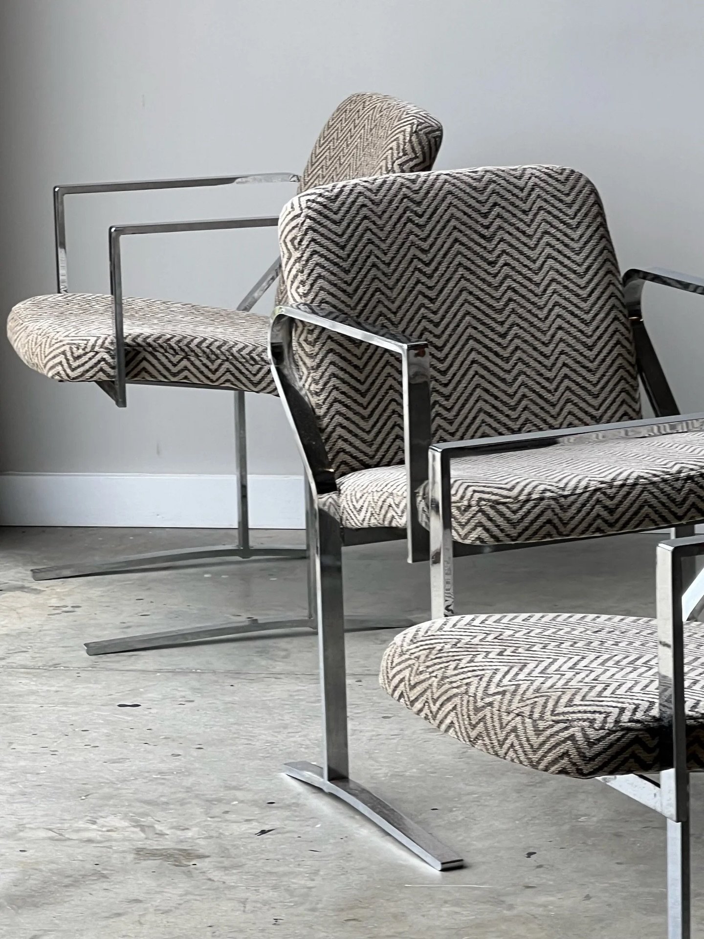 Reposting this killer set of eight dining chairs designed and manufactured by Design Institute of America or DIA, circa 1970s. Available online. 

Sturdy chrome frames that are perfect for dining or could even work as accent chairs. There is a slight