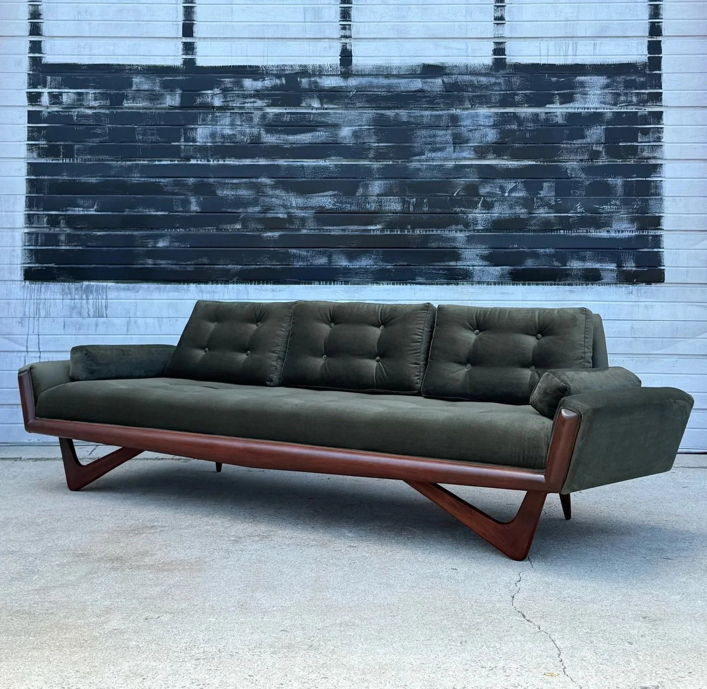 AVAILABLE ~ Mid-century &lsquo;Gondola&rsquo; sofa by Adrian Pearsall for Craft Associates, circa 1960s. Iconic mid-century design with walnut accents.

Long profile sofa sitting atop sculpted walnut legs. The front legs are triangular in shape and t