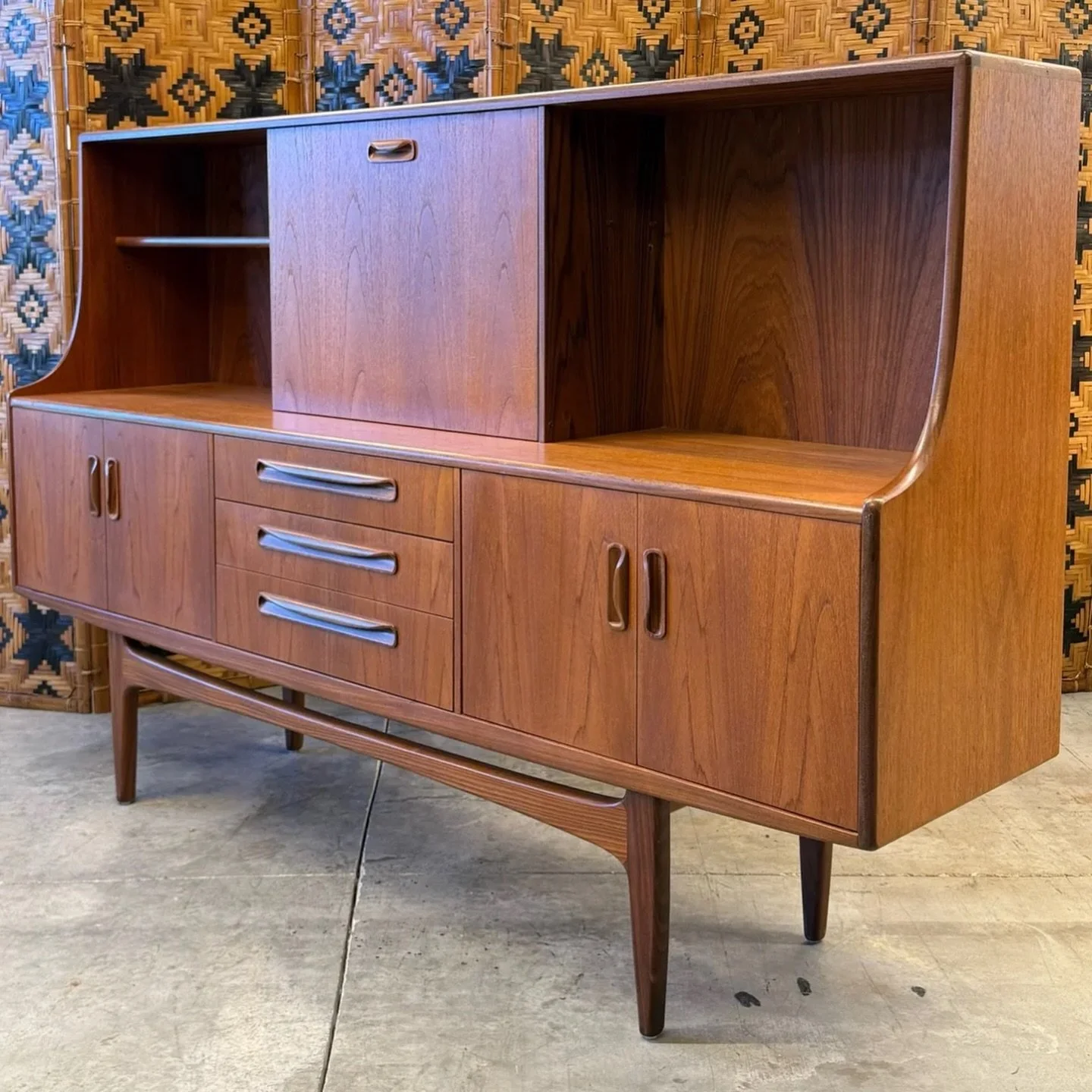 AVAILABLE ~ Mid-century &lsquo;Fresco&rsquo; highboard designed Victor B. Wilkins for G-Plan, circa 1960s. 

This teak piece features a credenza styled bottom and shelving atop. Storage and display opportunities are abundant with this piece and gorge
