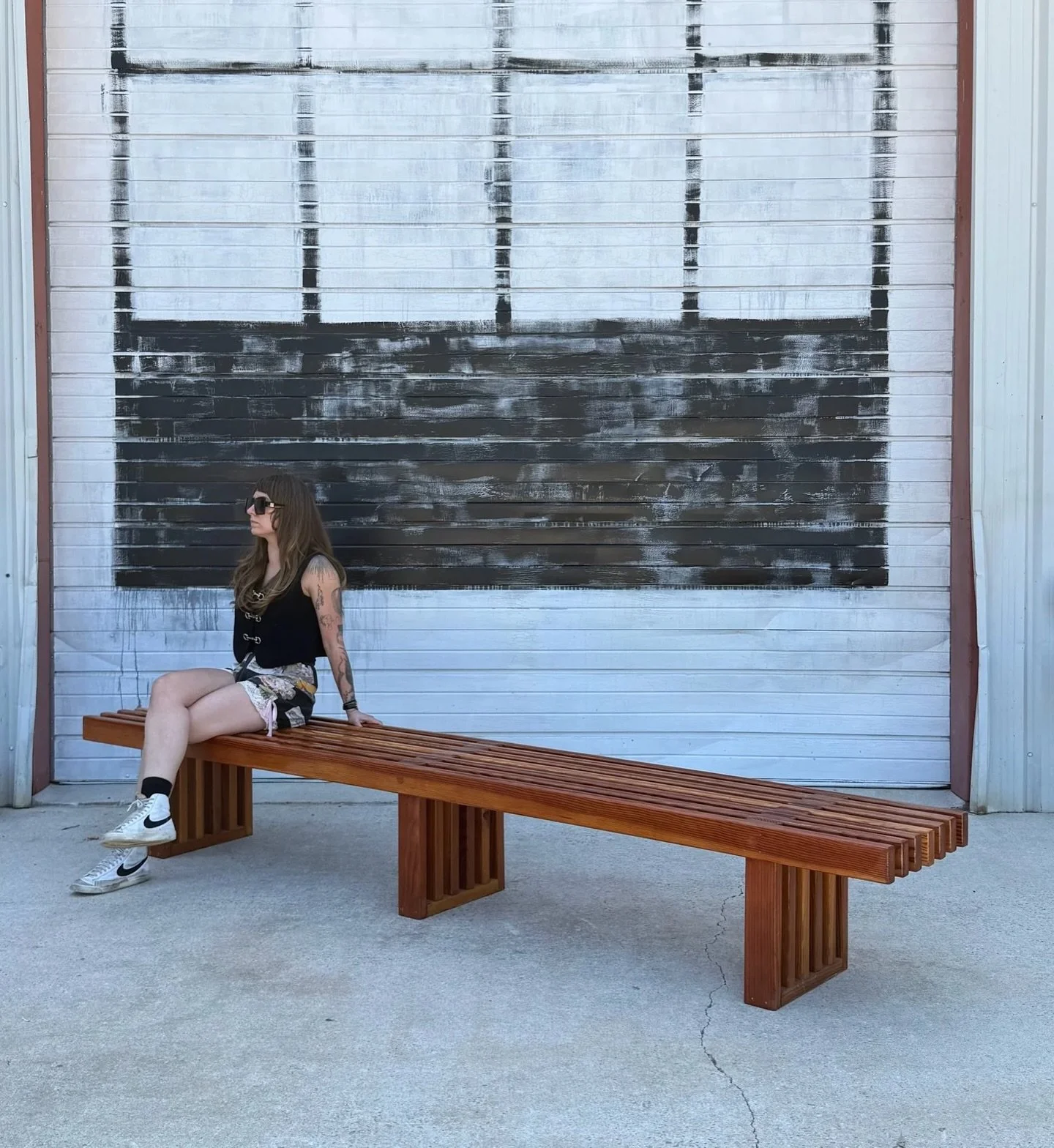 AVAILABLE ~ Massive solid wood slat bench, reaching 10 ft in length. 

Sturdy with three main supports which are also in the slat style. We polyurethaned this bench to be weather resistant. This is one of four benches we have in stock, if you are int