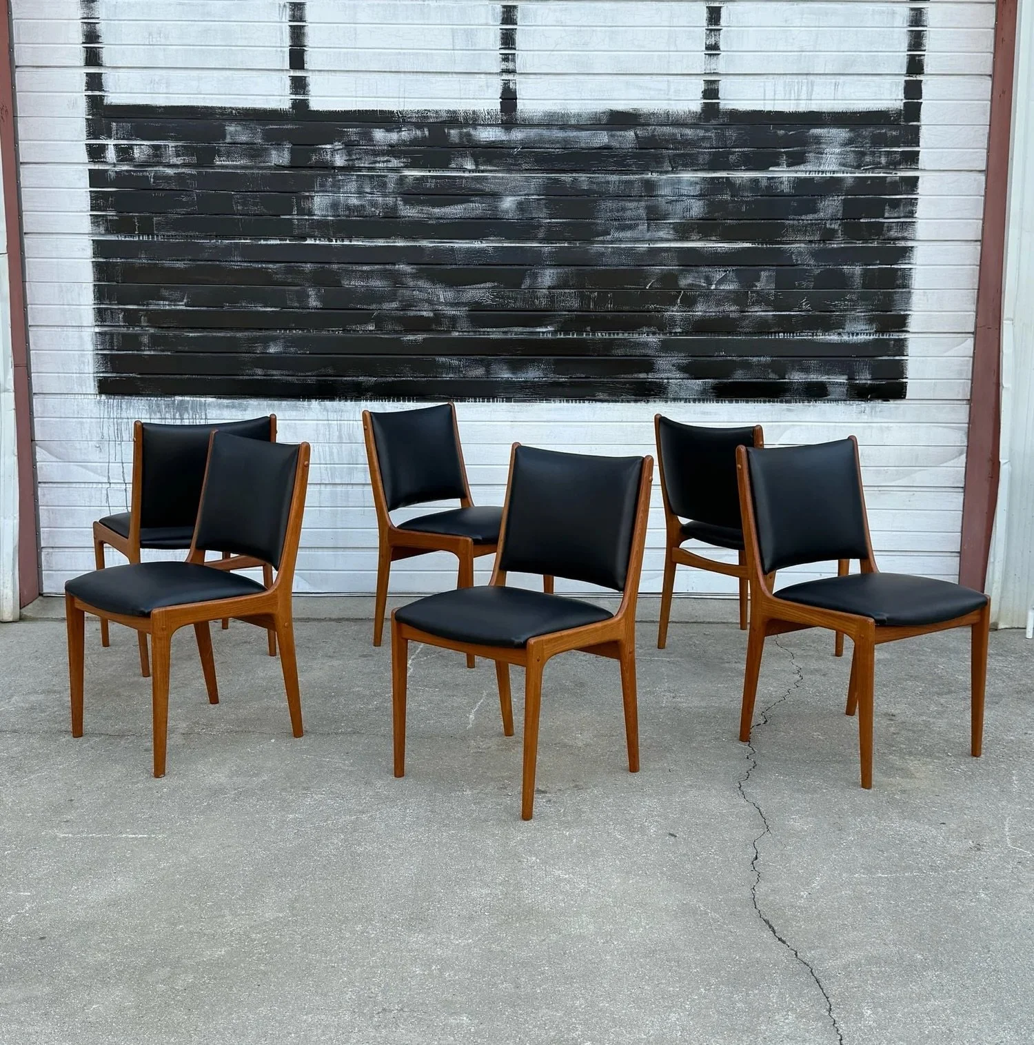 AVAILABLE ~ Mid-century Danish set of six dining chairs designed by Johannes Andersen. 

Crafted from sculpted teak wood. The teak frames are sturdy, streamlined, and create a fantastic side profile. The frame features soft curves and tapered ends sh