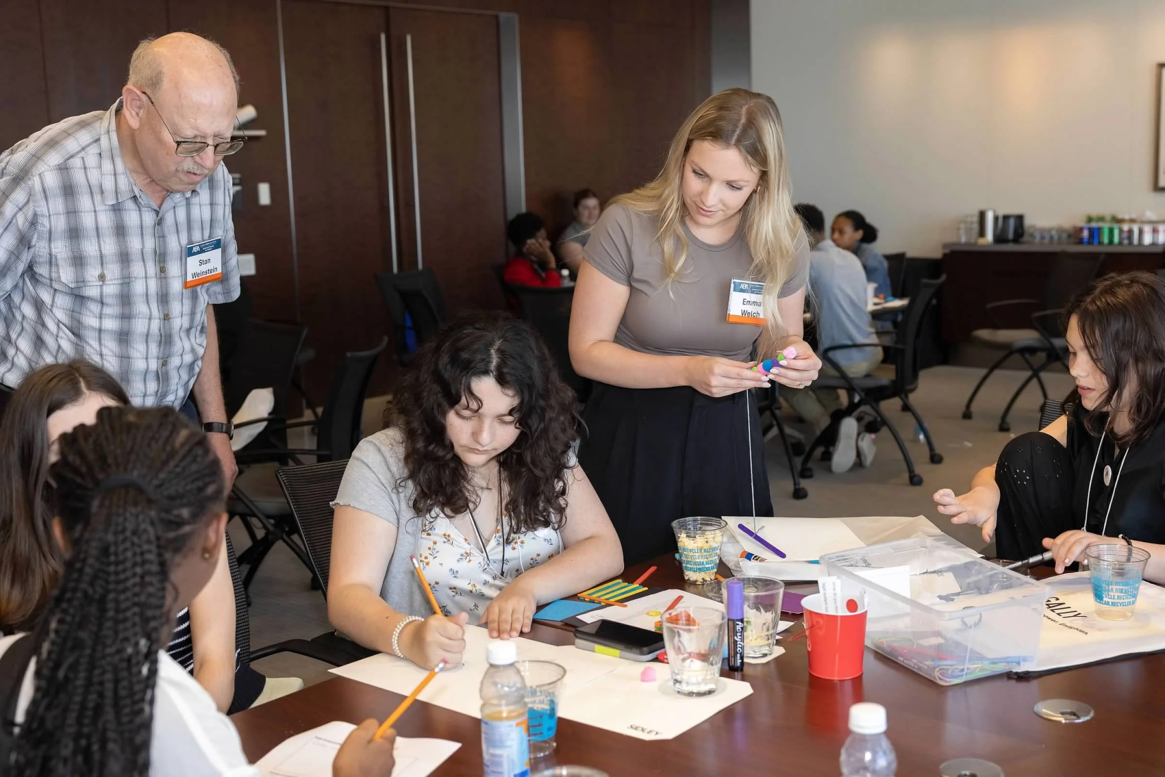 Students working with volunteers.jpeg