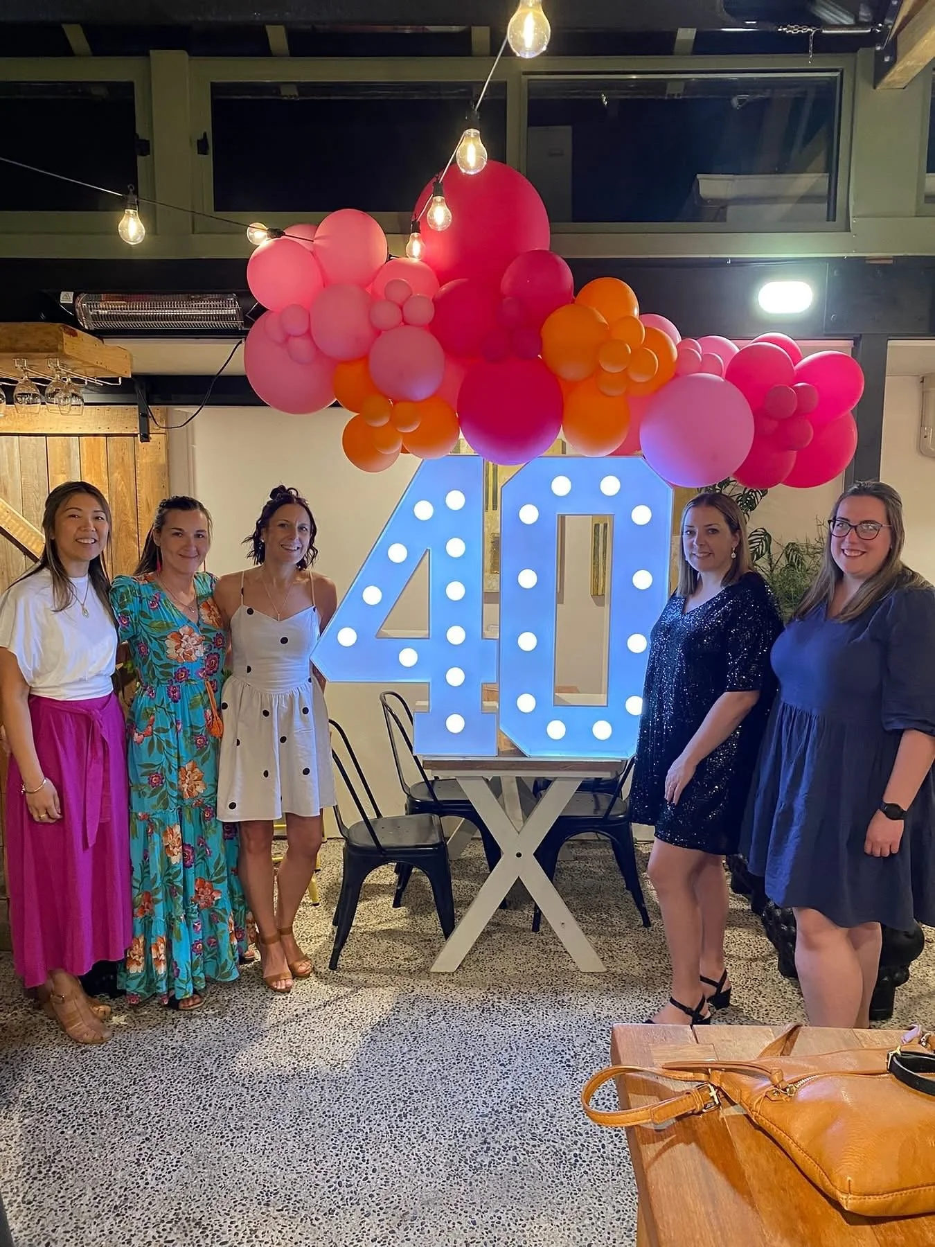 Turning forty and bringing the fun! 🎉✨

Our glowing marquee 40 number lights set the scene, paired perfectly with a vibrant mix of hot pink, candy pink, and orange balloons 💖🧡💗

Bold, bright, and bursting with energy &mdash; just how every milest
