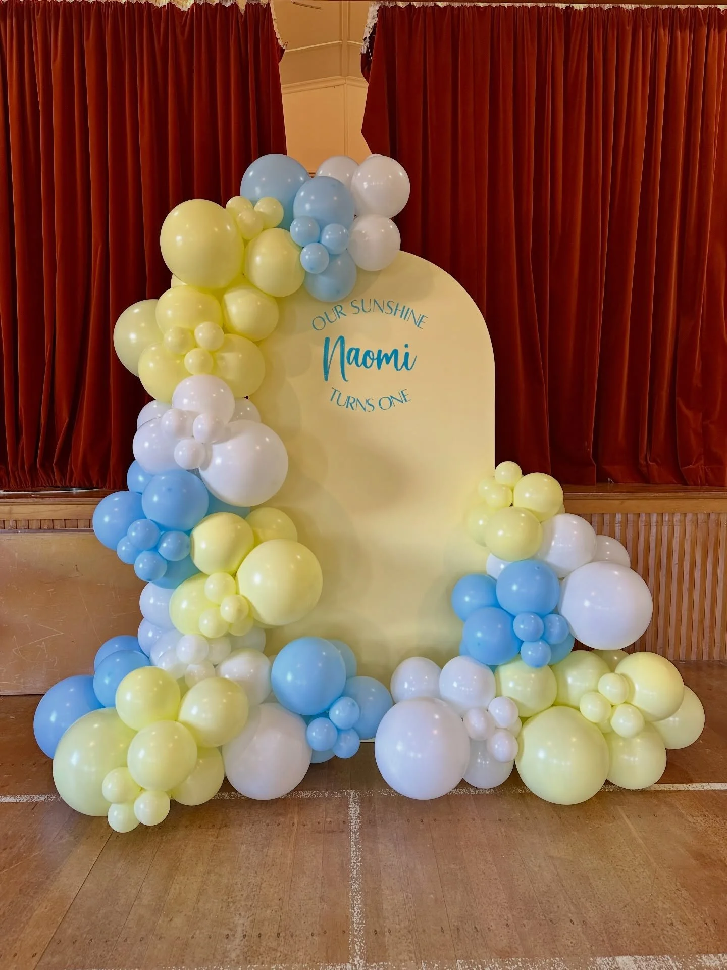 🌞 Naomi turns ONE! 🌼💙

A sweet pastel yellow wall, cheerful blue decal, and soft white, pastel yellow &amp; pastel blue balloons perfectly complemented her gorgeous little dress. ✨💛

Venue - Henley Community Centre

Happy 1st birthday, Naomi! 🎂?